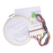 Embroidery hoop with pre-printed design, thread, and stitch guide on a white background