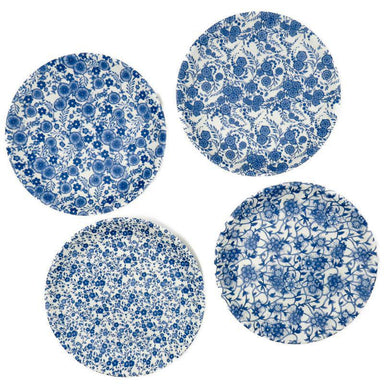 Four blue and white floral-patterned plates on a white background
