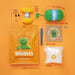 Crochet kit with yarn, hook, and instructions on an orange background