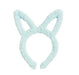 Light blue bunny ear headband on a white background