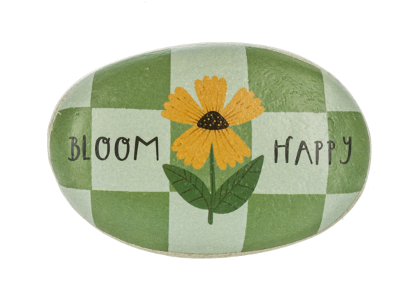 Decorative stone with a yellow flower and text 'Bloom Happy' on a green and white checkered background
