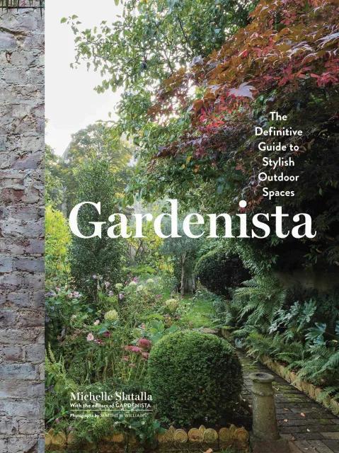 Book cover of 'Gardenista' with a garden scene and stone wall.