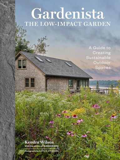 Book cover of 'The Low-Impact Garden' by Kendra Wilson with a scenic house and garden.