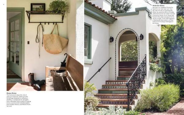 Home exterior with front door, steps, and garden area.