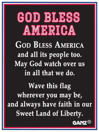 Text sign with 'God Bless America' and patriotic message on a black background