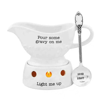 Gravy Boat Warming Set. This four-piece set includes a ceramic gravy boat, a ceramic warming base, a tea light, and a stamped silver-plate spoon.