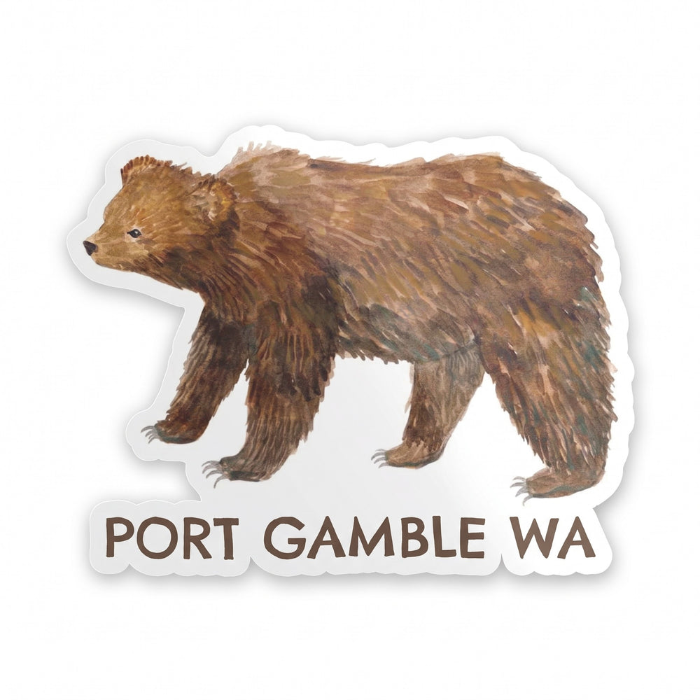 A die-cut sticker featuring a brown watercolor-style illustration of a grizzly bear above the text 'PORT GAMBLE WA' in brown lettering, shown on a white background.