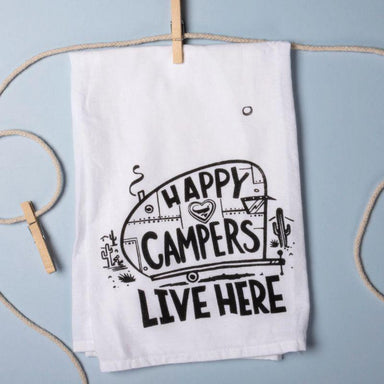 White towel with 'Happy Campers Live Here' text and graphics on a light blue background