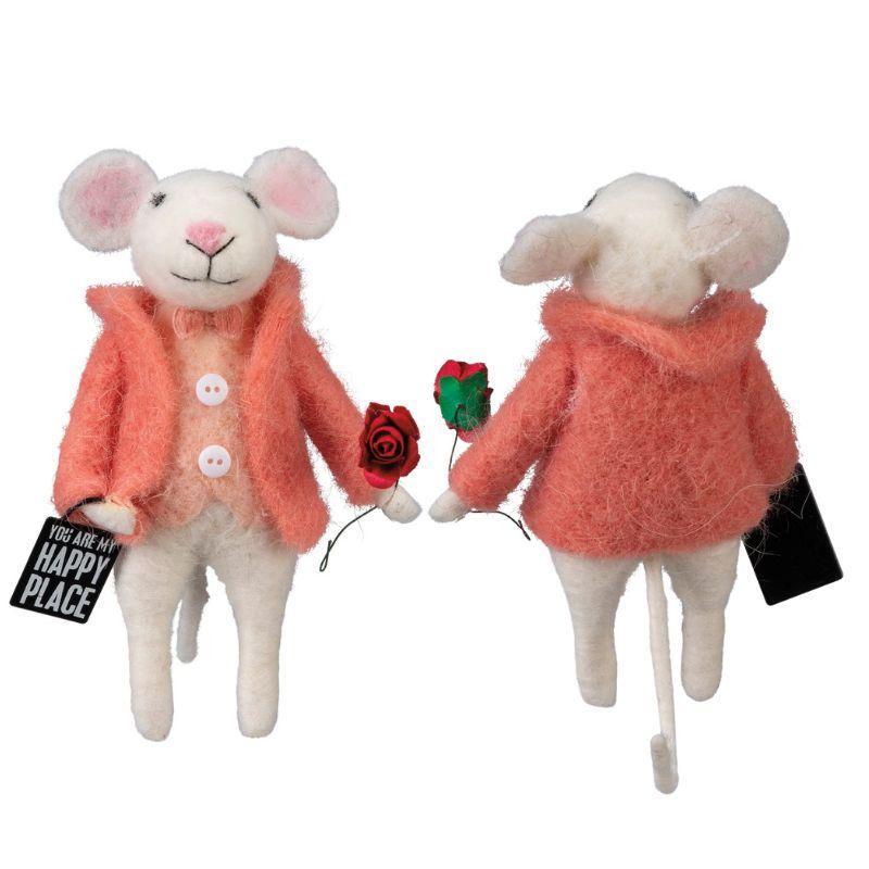 Two plush mouse toys in pink coats holding flowers on a white background