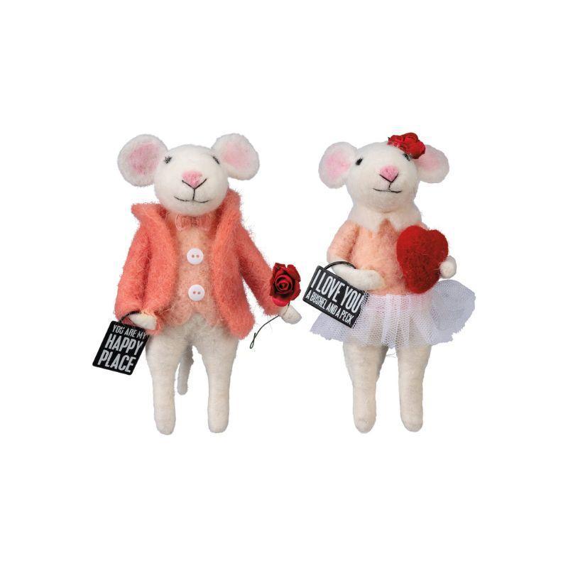 Two plush mouse toys with one wearing a coat and holding a rose, and the other holding a heart, on a white background.