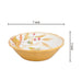 A decorative ceramic bowl with autumn-themed leaf and wheat patterns on a white interior, shown with dimension lines indicating a height of 2 inches and a width of 7 inches.