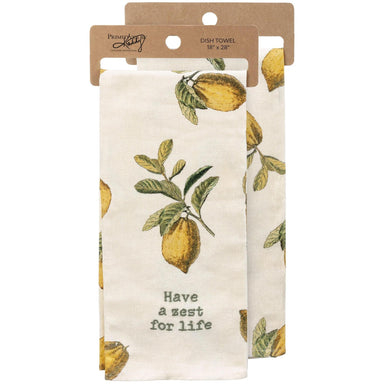Dish towel with lemon design and text 'Have a zest for life' in packaging