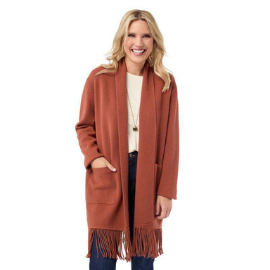 Woman wearing a brown cardigan with fringe on a white background