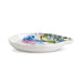Floral-patterned ceramic spoon rest on a white background