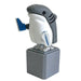 A shark-shaped novelty foot stuffer on a gray pedestal base, featuring a white and gray shark head with blue accents and a gray base, isolated on a white background.
