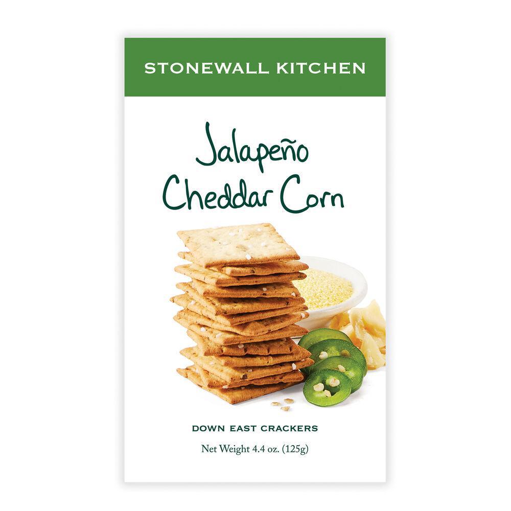 Stonewall Kitchen jalapeño cheddar corn crackers packaging with crackers and jalapeños on a white background.