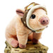 a cute little pink plushie piglet wearing an aviators hat. 