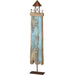 Decorative lighthouse sculpture with a distressed wood finish on a white background