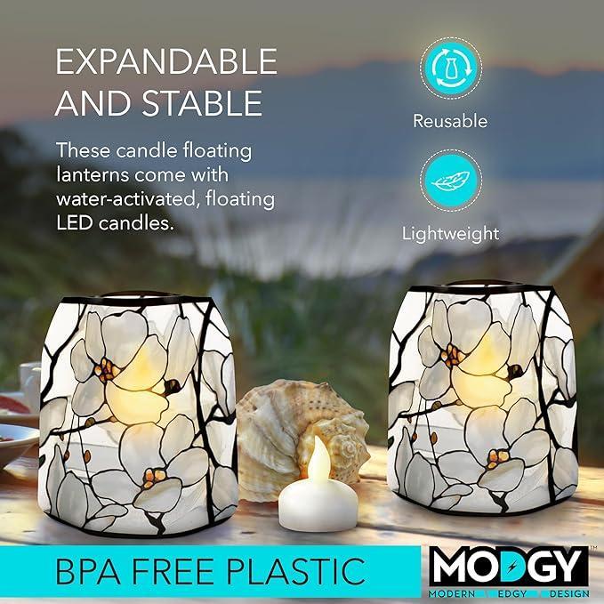 Floral-patterned candle floating lanterns with LED candles on a table, featuring Modgy brand.