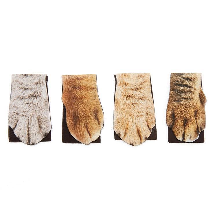 Four pairs of socks with animal paw prints on a white background