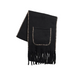 A black knit scarf with fringed ends and a front pocket, featuring light beige contrast stitching along the edges and around the pocket, displayed on a light gray background.