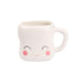 White mug with a face design on a white background