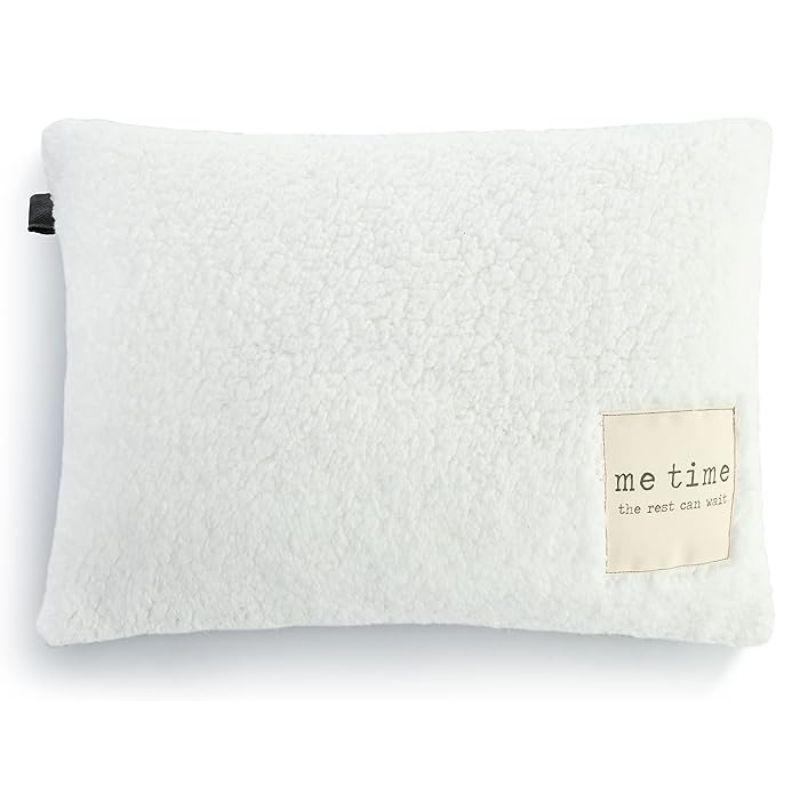 White textured pillow with a label on a white background