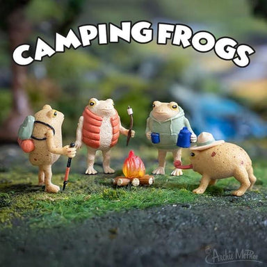 Toy frogs dressed as campers around a campfire with 'Camping Frogs' text above.