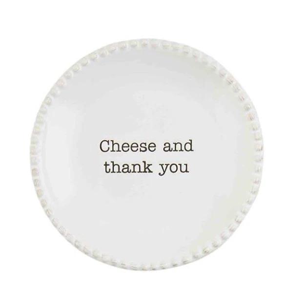 Round white plate with 'Cheese and thank you' text on a white background