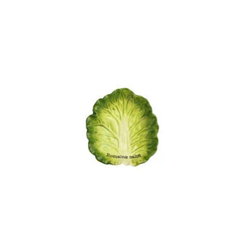 Green leafy vegetable dish with 'Romaine calm' text on a white background