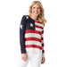 Woman wearing a sweater with an American flag design on a white background