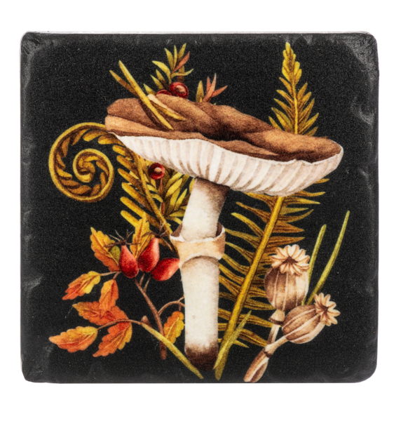 Decorative tile with a mushroom and foliage design on a black background