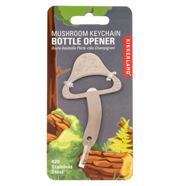 Mushroom keychain bottle opener on Kikkerland packaging with nature-themed design.