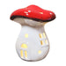 Mushroom-shaped night light with red cap and white body on a white background