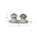 Mushroom-shaped salt and pepper shakers on a tray with measurements