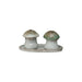 Mushroom-shaped salt and pepper shakers on a matching tray with a white background