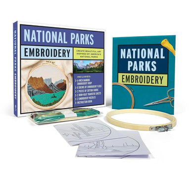 National Parks Embroidery kit with books, hoop, and patterns on a white background