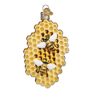 Decorative ornament with a honeycomb and bees on a white background
