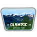 A die-cut sticker featuring an illustrated mountain landscape with snow-capped peaks, evergreen trees, and the text 'OLYMPIC NATIONAL PARK' with '1938' on a white background.