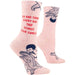 Pink socks with alligator design and text on a white background