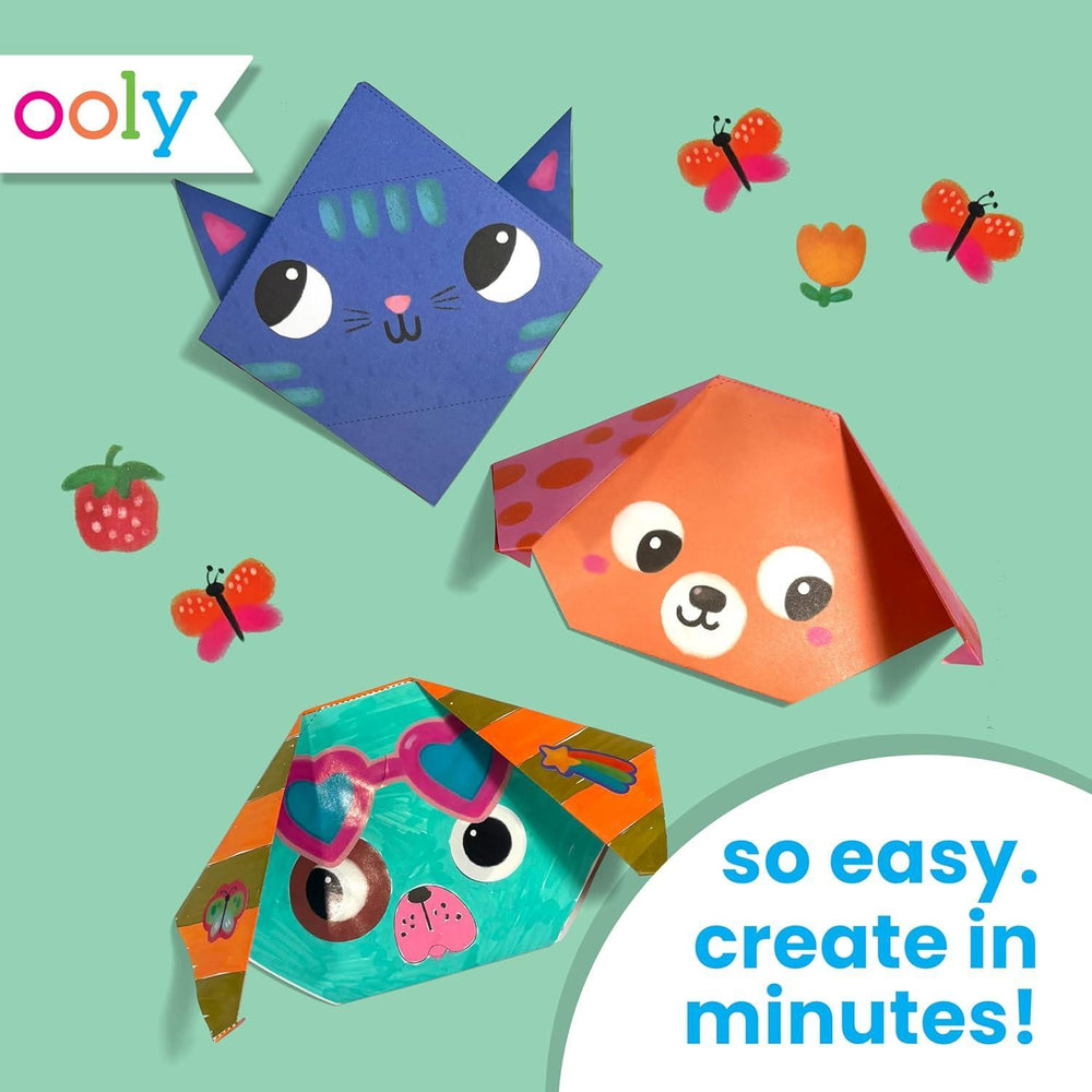 Colorful paper animal crafts with 'ooly' branding on a light green background