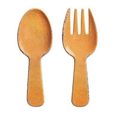 A set of two disposable plastic utensils, a spoon and a spork, made from a textured orange-brown material with a dark speckled edge, shown against a plain white background.