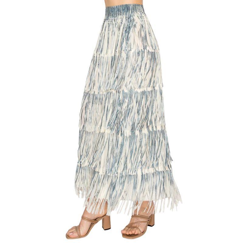 Long tiered skirt with a white and blue pattern on a white background