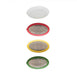 Set of four round grating tools in different colors on a white background