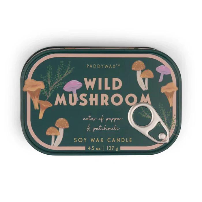 Paddywax Wild Mushroom candle tin with mushroom illustrations on a white background