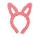 Pink bunny ear headband on a white background
