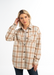 Woman wearing a plaid shirt on a white background