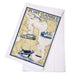 Tea towel with Port Gamble, Washington design featuring a map and nautical elements.