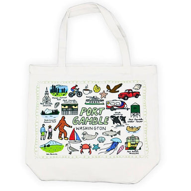 White tote bag with colorful illustrations of Port Gamble, Washington on a white background