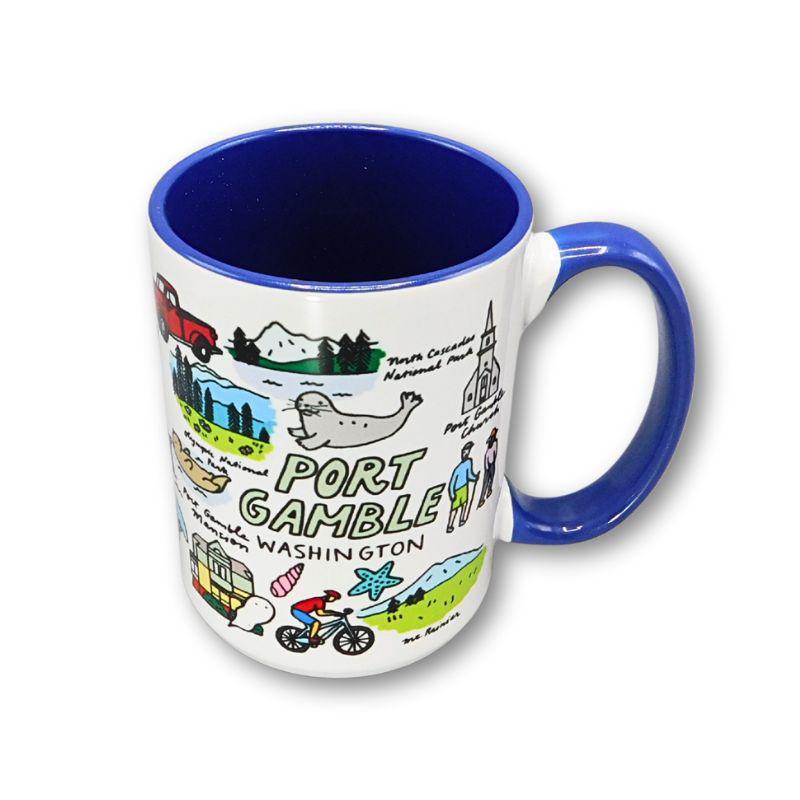 Mug with illustrations and text about Port Gamble, Washington on a white background